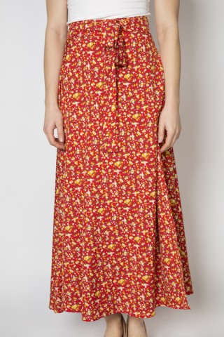 Falda maxi larga cruzada roja con flores amarillas