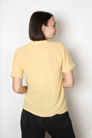 Camisa vintage amarillo con volante