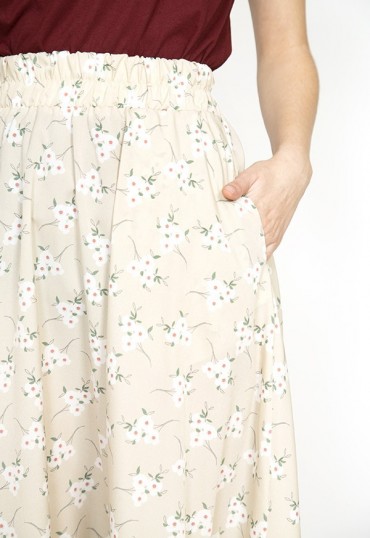 Falda maxi larga beis con flores blancas